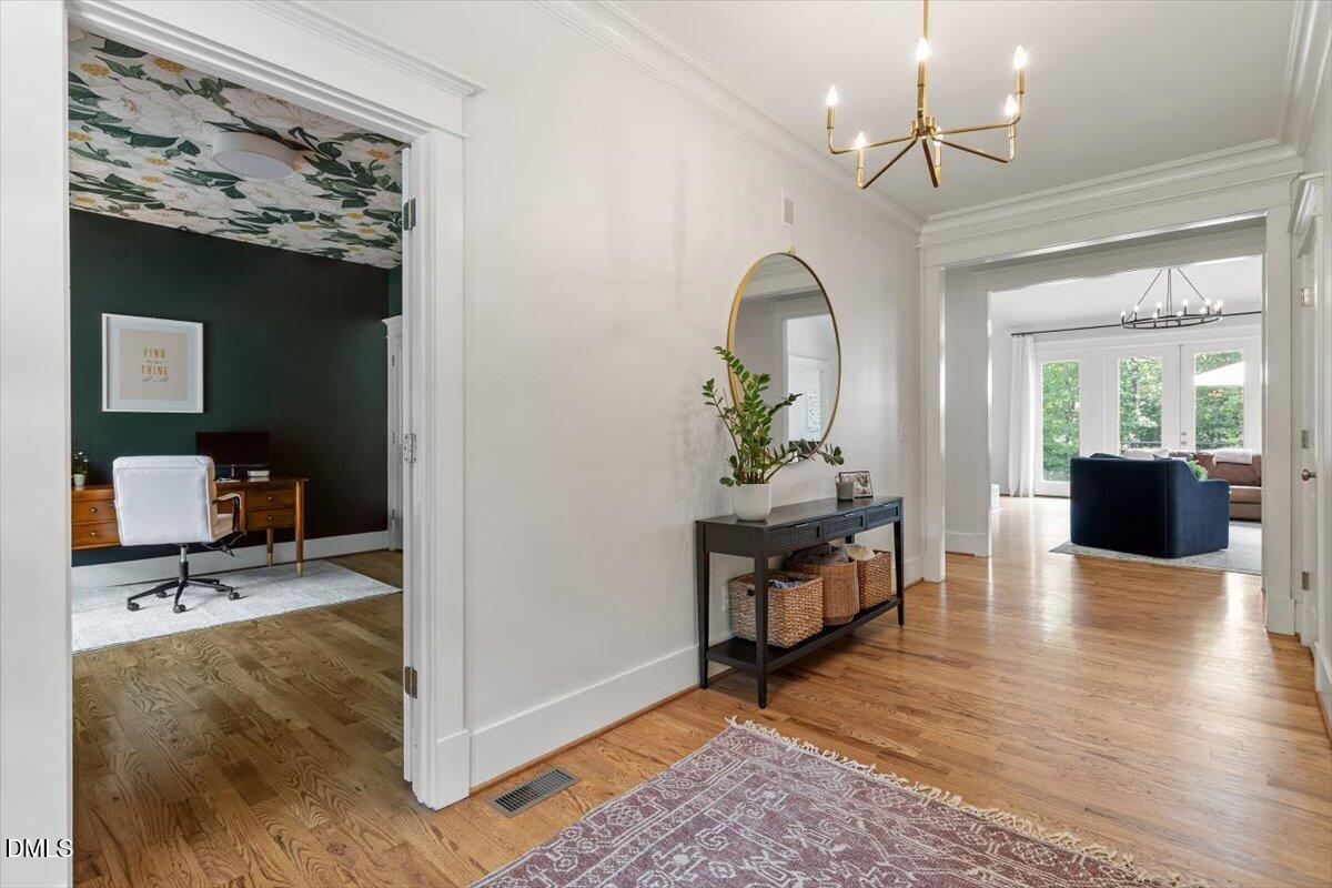 595 Billets Run Moncure, NC 27559 - Photo 12 of 54 a living room with furniture and a chandelier