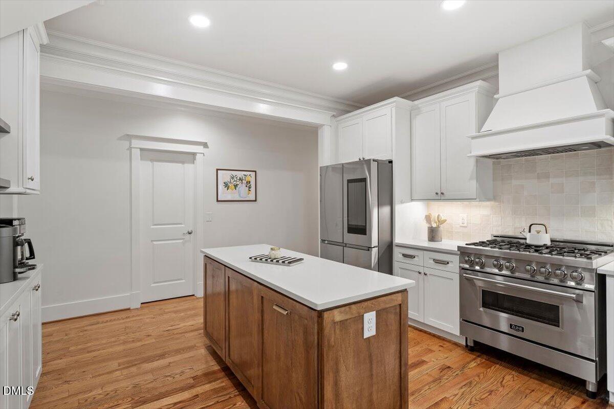 595 Billets Run Moncure, NC 27559 - Photo 23 of 54 a kitchen with a stove and a refrigerator