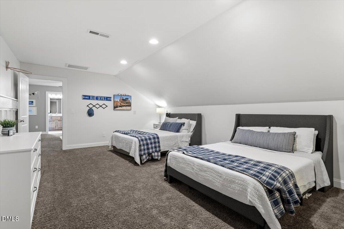 595 Billets Run Moncure, NC 27559 - Photo 43 of 54 a bedroom with two beds and a couch