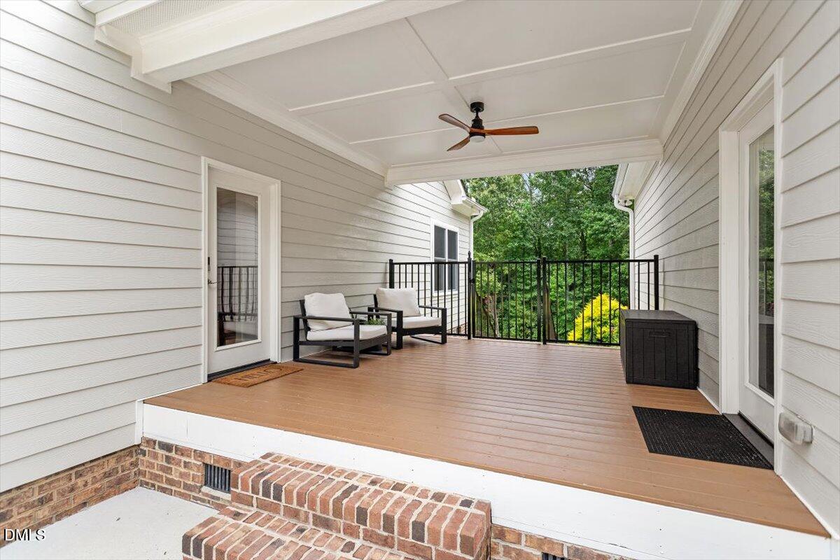 595 Billets Run Moncure, NC 27559 - Photo 44 of 54 a balcony with furniture and a potted plant