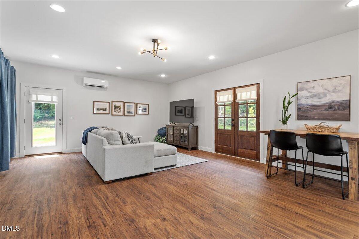 595 Billets Run Moncure, NC 27559 - Photo 45 of 54 a living room with furniture and a wooden floor