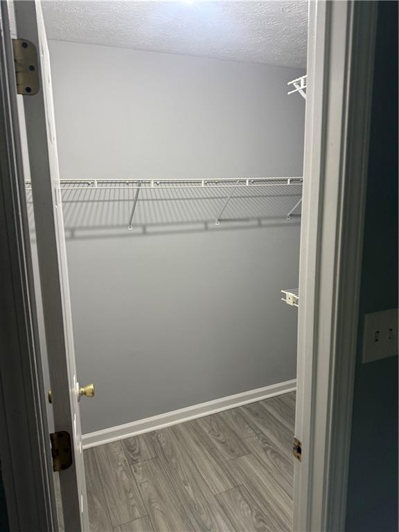 6341 Wedgeview Drive Tucker, GA 30084 - Photo 20 of 26 a view of a room with wooden floor
