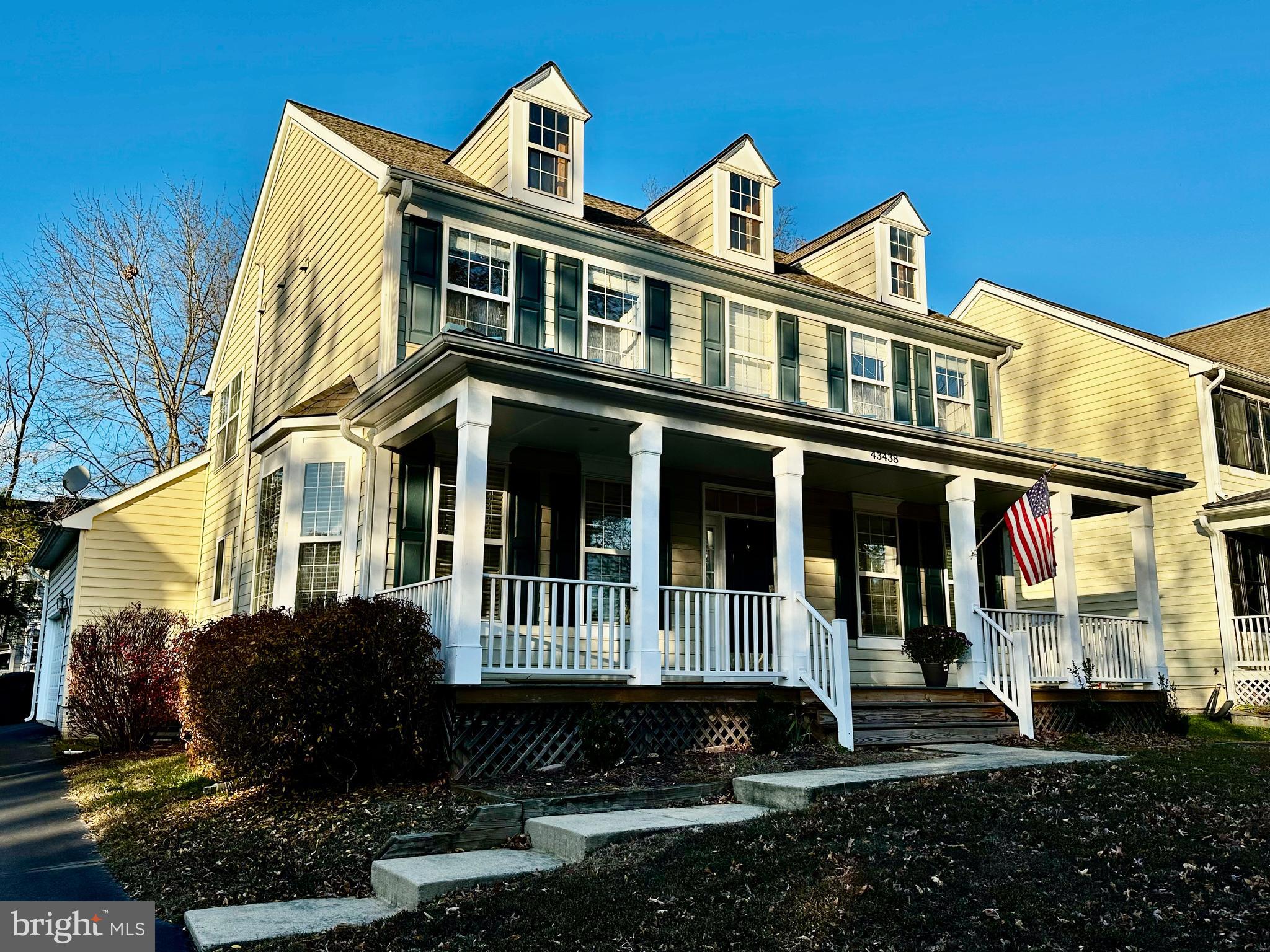 43438 Oxen Lane Chantilly, VA 20152 - Photo 2 of 49 a front view of a house with a yard
