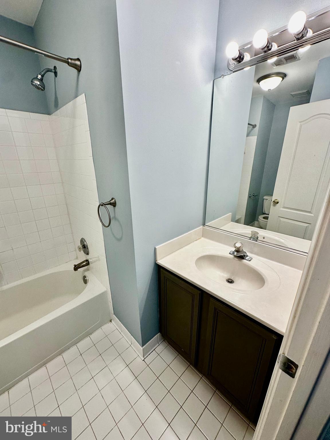 43438 Oxen Lane Chantilly, VA 20152 - Photo 36 of 49 a bathroom with a sink and a mirror
