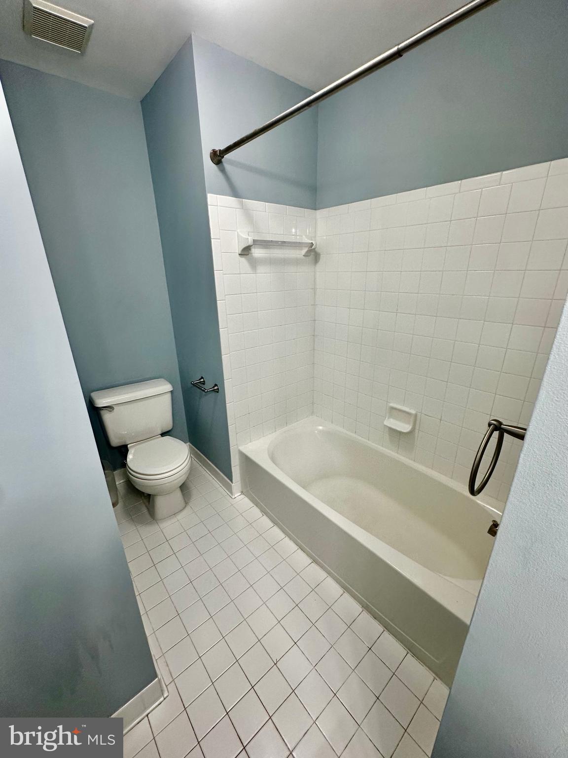 43438 Oxen Lane Chantilly, VA 20152 - Photo 37 of 49 a bathroom with a shower and a toilet