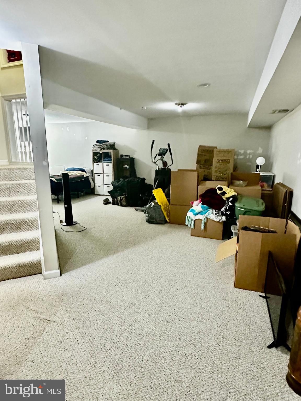 43438 Oxen Lane Chantilly, VA 20152 - Photo 39 of 49 a living room with furniture and a flat screen tv