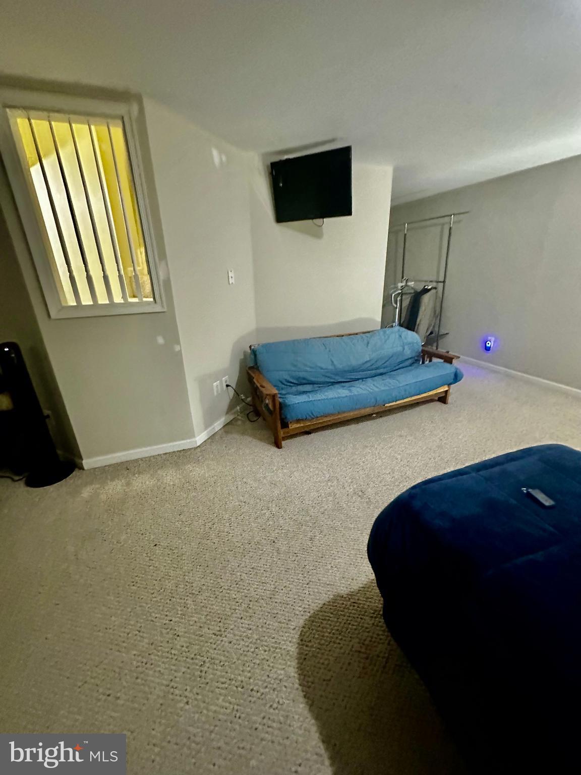 43438 Oxen Lane Chantilly, VA 20152 - Photo 42 of 49 a living room with furniture and a flat screen tv