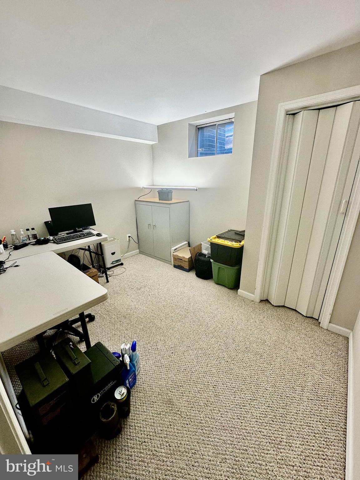 43438 Oxen Lane Chantilly, VA 20152 - Photo 44 of 49 a bedroom with a bed and cabinets