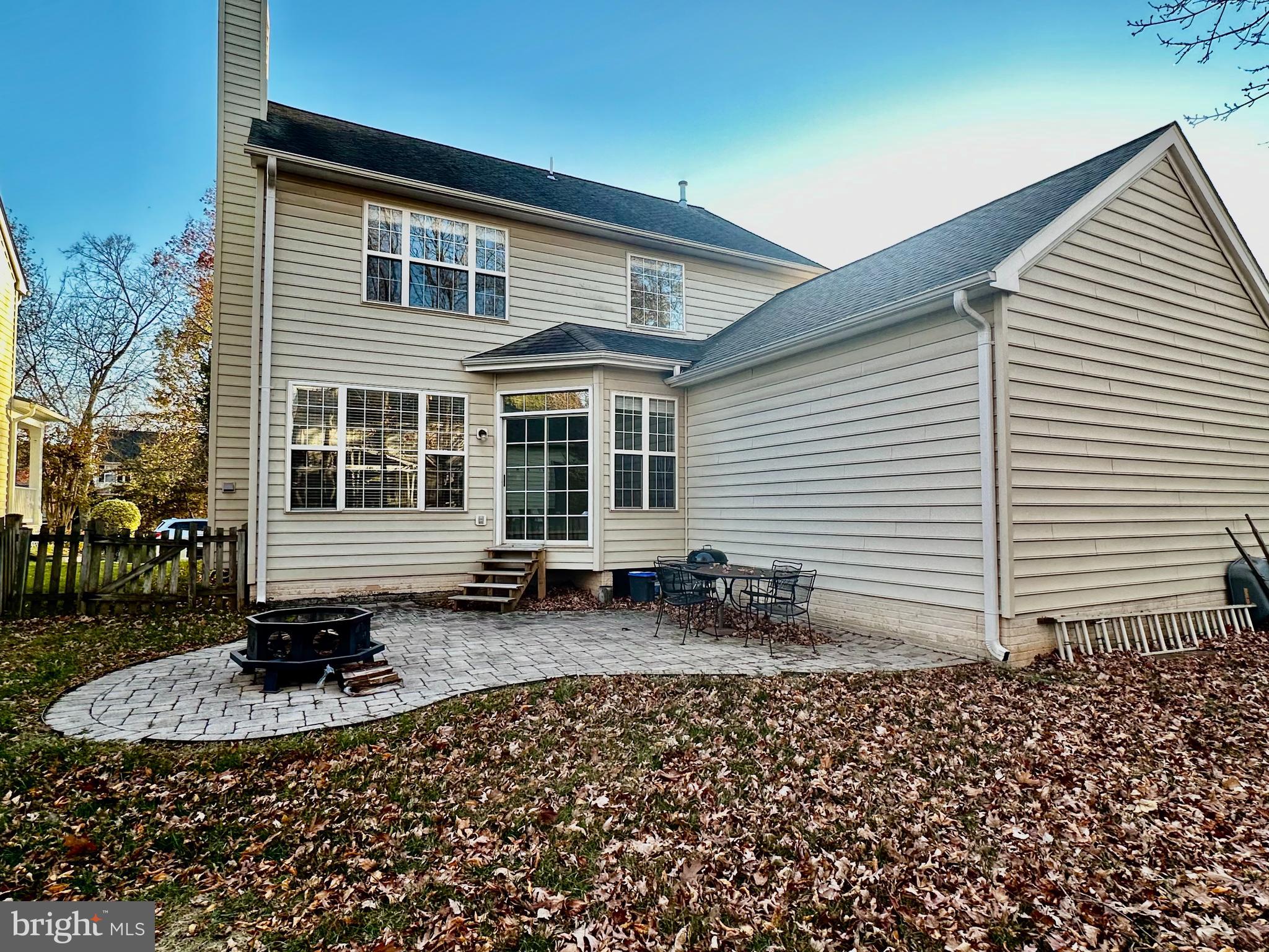 43438 Oxen Lane Chantilly, VA 20152 - Photo 6 of 49 a front view of a house with a garden
