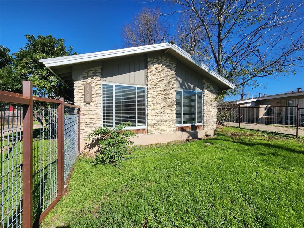 2708 St Edwards Circle, Unit A Austin, TX 78704 - Photo 12 of 13 View of side of property featuring stone siding