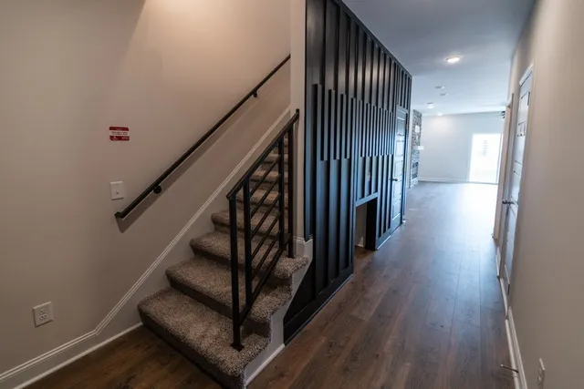 a bathroom with a shower and a sink
