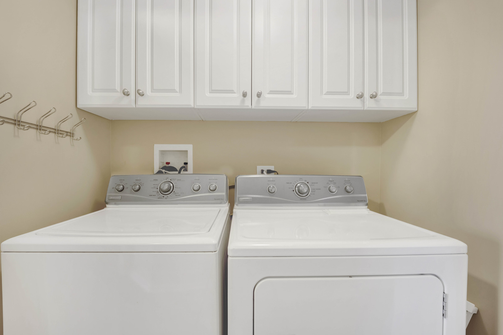 201 West Brush Hill Road, Unit 203 Elmhurst, IL 60126 - Photo 16 of 24 a utility room with dryer and washer