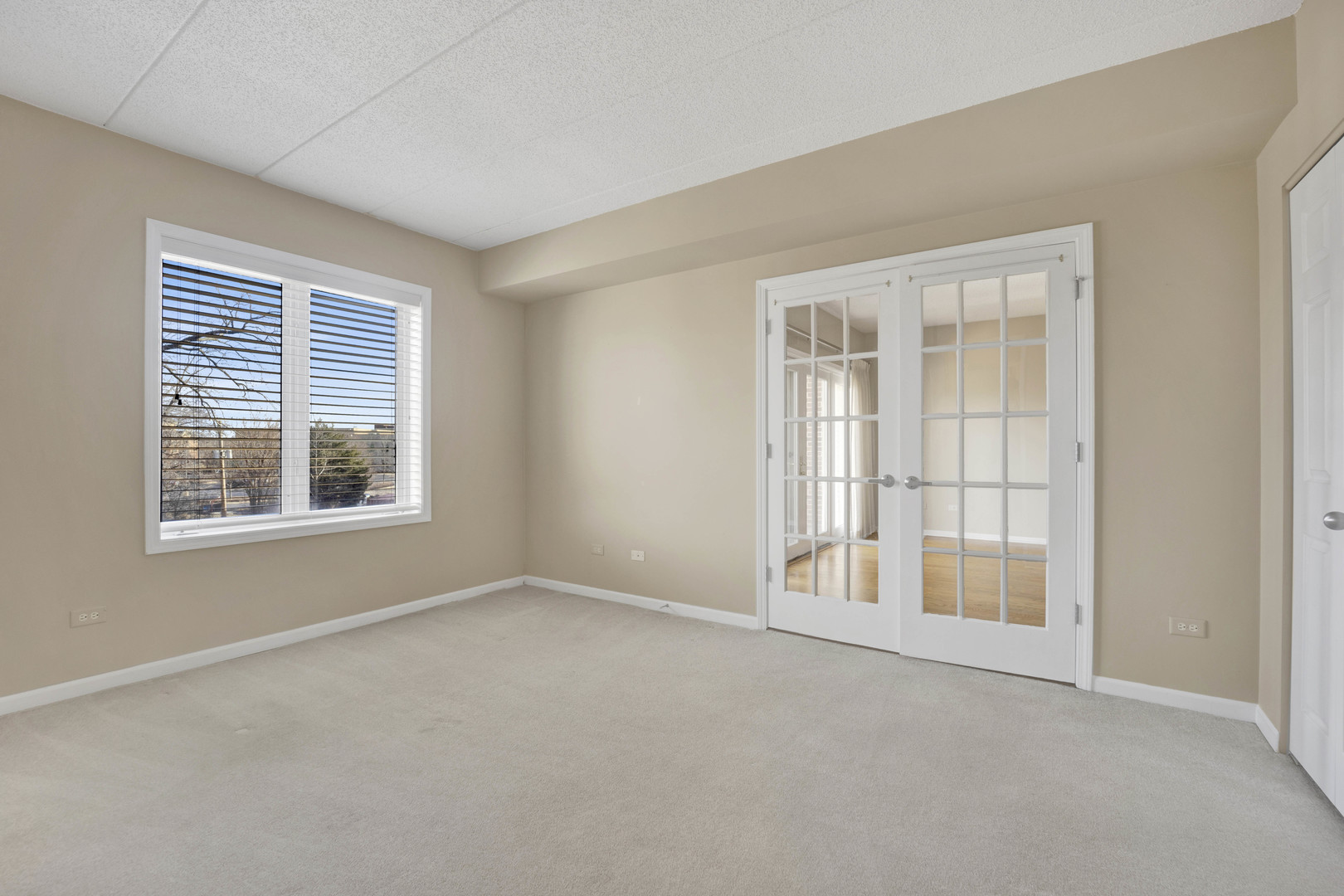 201 West Brush Hill Road, Unit 203 Elmhurst, IL 60126 - Photo 19 of 24 a view of an empty room with a window