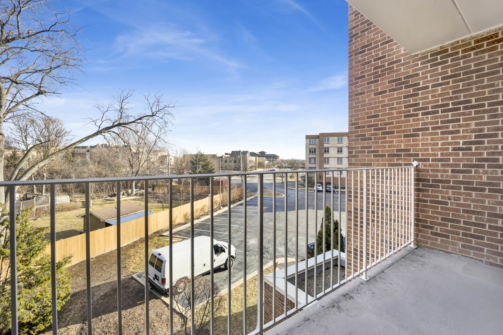 201 West Brush Hill Road, Unit 203 Elmhurst, IL 60126 - Photo 22 of 24 a view of a balcony