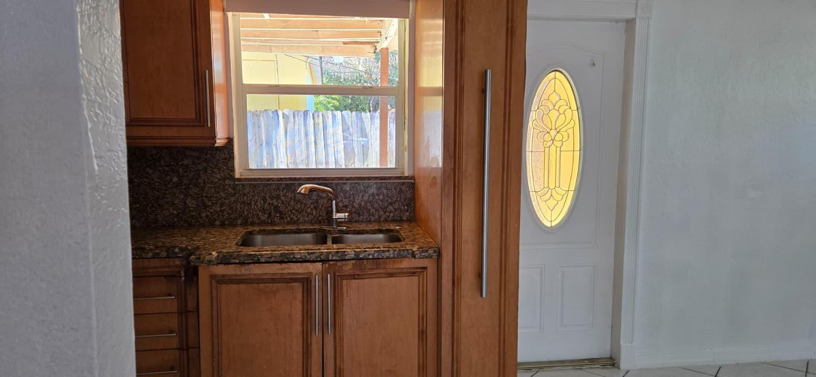 112 Newton Road West Park, FL 33023 - Photo 6 of 31 a view of a sink and a mirror