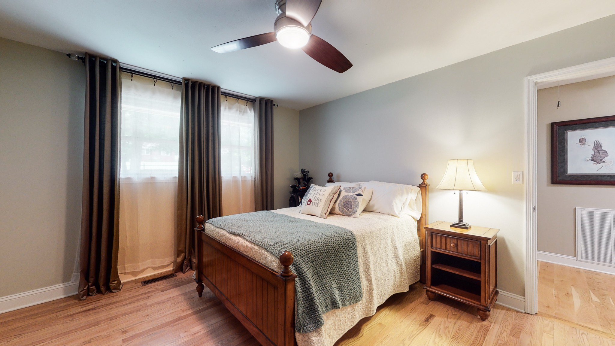 712 Spring Creek Road Lebanon, TN 37087 - Photo 15 of 33 a bedroom with a bed and wooden floor