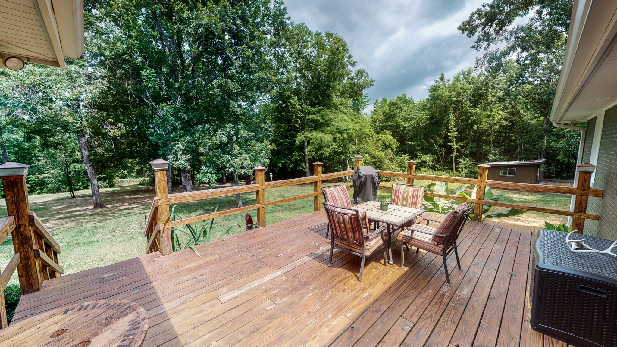 712 Spring Creek Road Lebanon, TN 37087 - Photo 21 of 33 a view of deck with furniture and trees