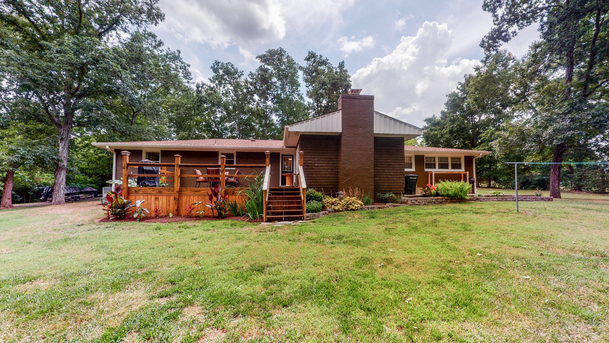 712 Spring Creek Road Lebanon, TN 37087 - Photo 22 of 33 a view of a house with backyard and porch