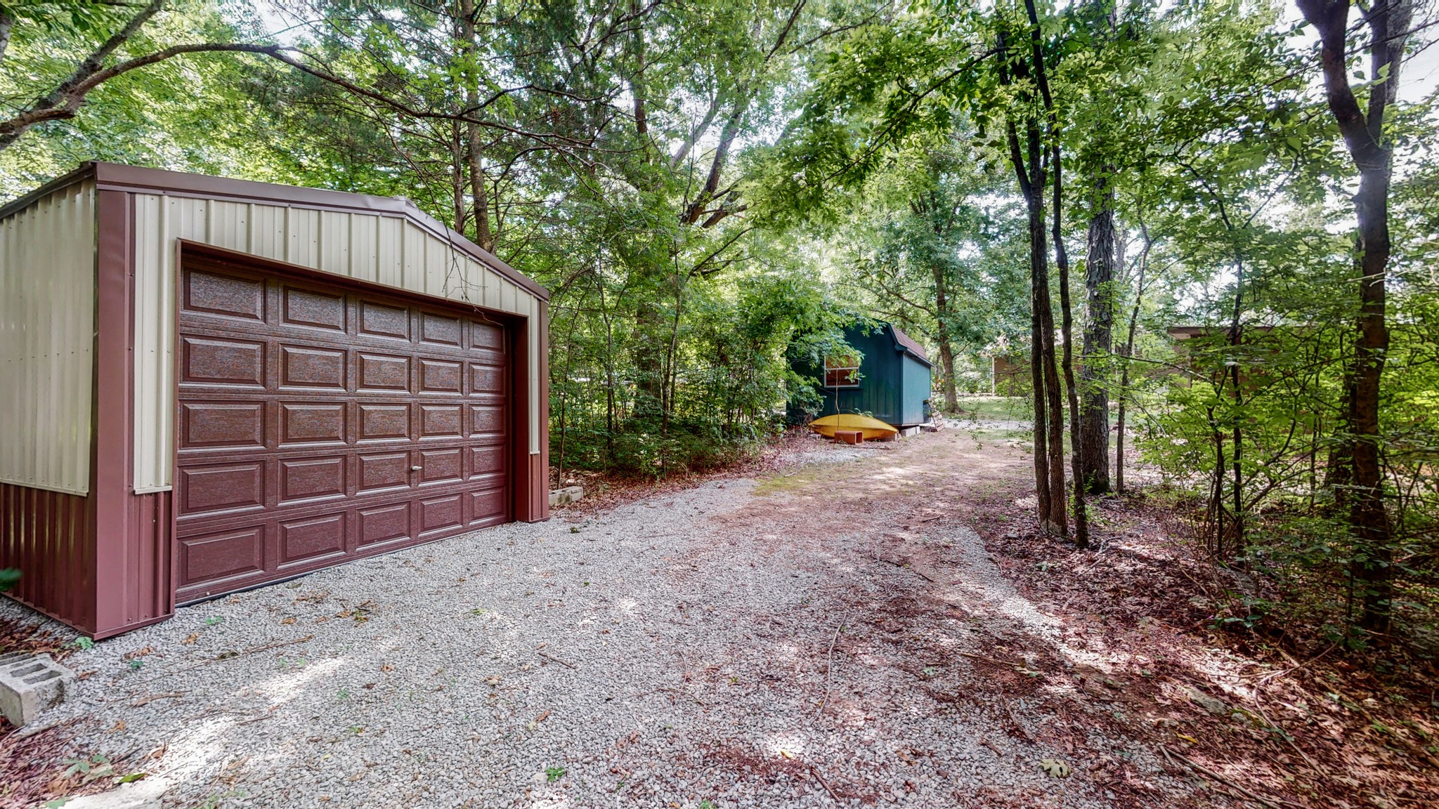 712 Spring Creek Road Lebanon, TN 37087 - Photo 23 of 33 a view of a house with a backyard