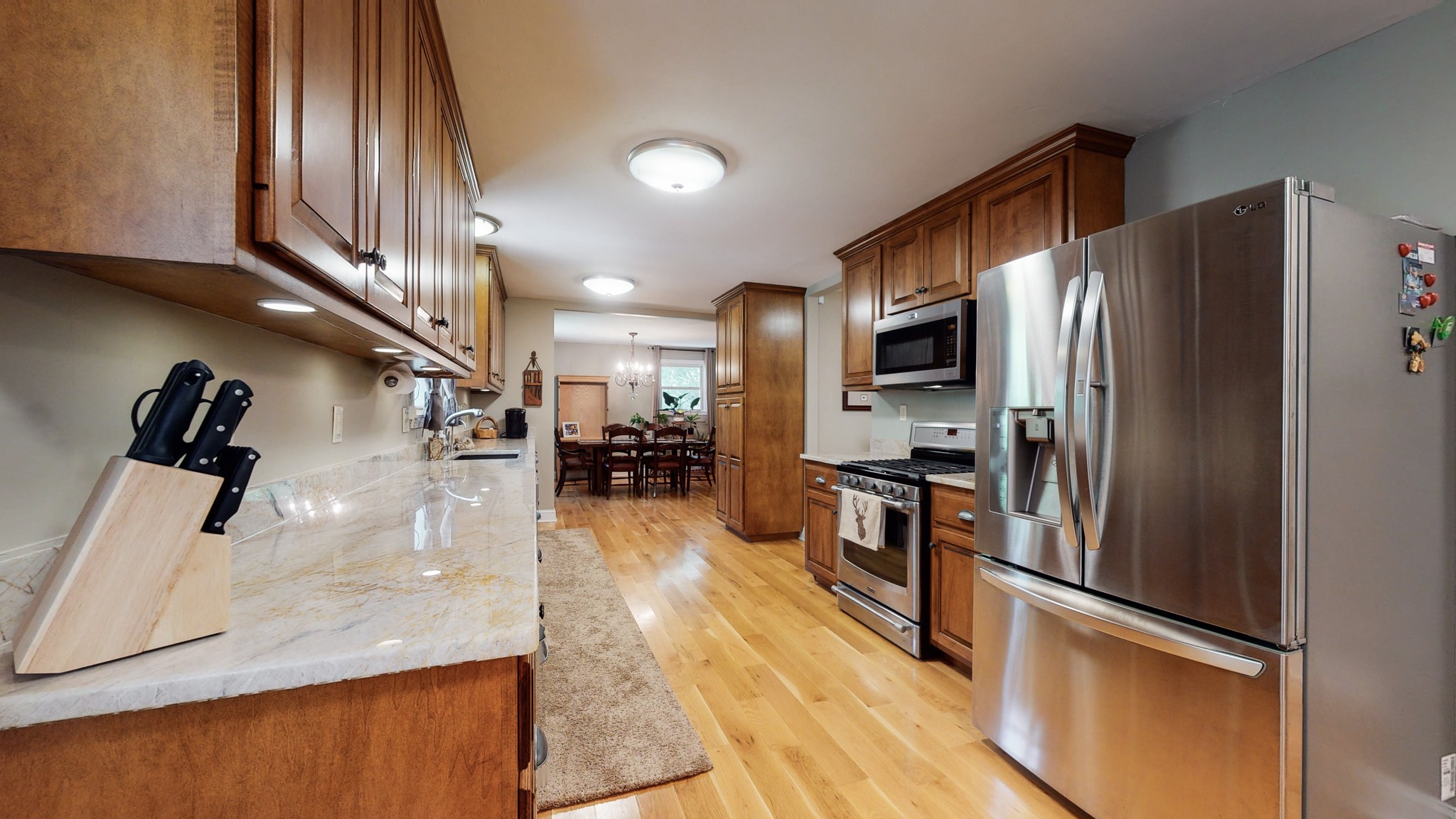 712 Spring Creek Road Lebanon, TN 37087 - Photo 6 of 33 a kitchen with stainless steel appliances granite countertop a refrigerator a stove and a sink