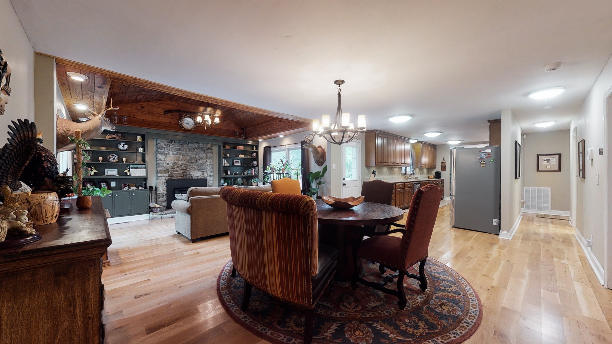 712 Spring Creek Road Lebanon, TN 37087 - Photo 8 of 33 a view of a dining room with furniture and wooden floor