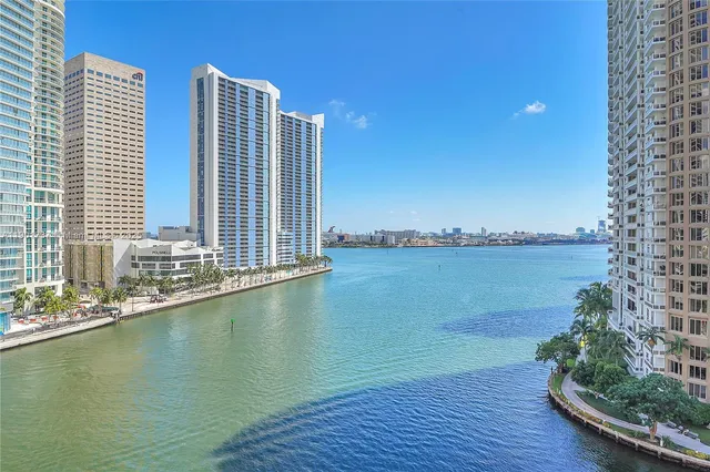 a view of outdoor space with swimming pool and lake view