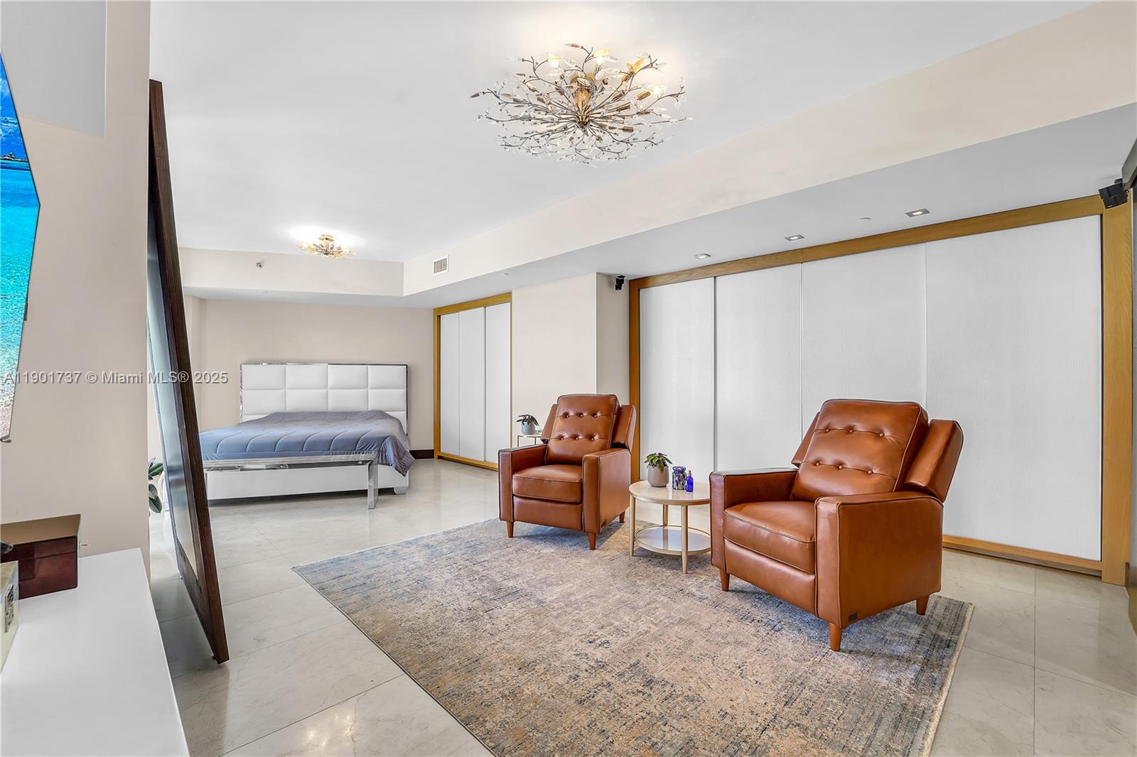 465 Brickell Avenue, Unit 1001 Miami, FL 33131 - Photo 19 of 42 a living room with furniture and a large window