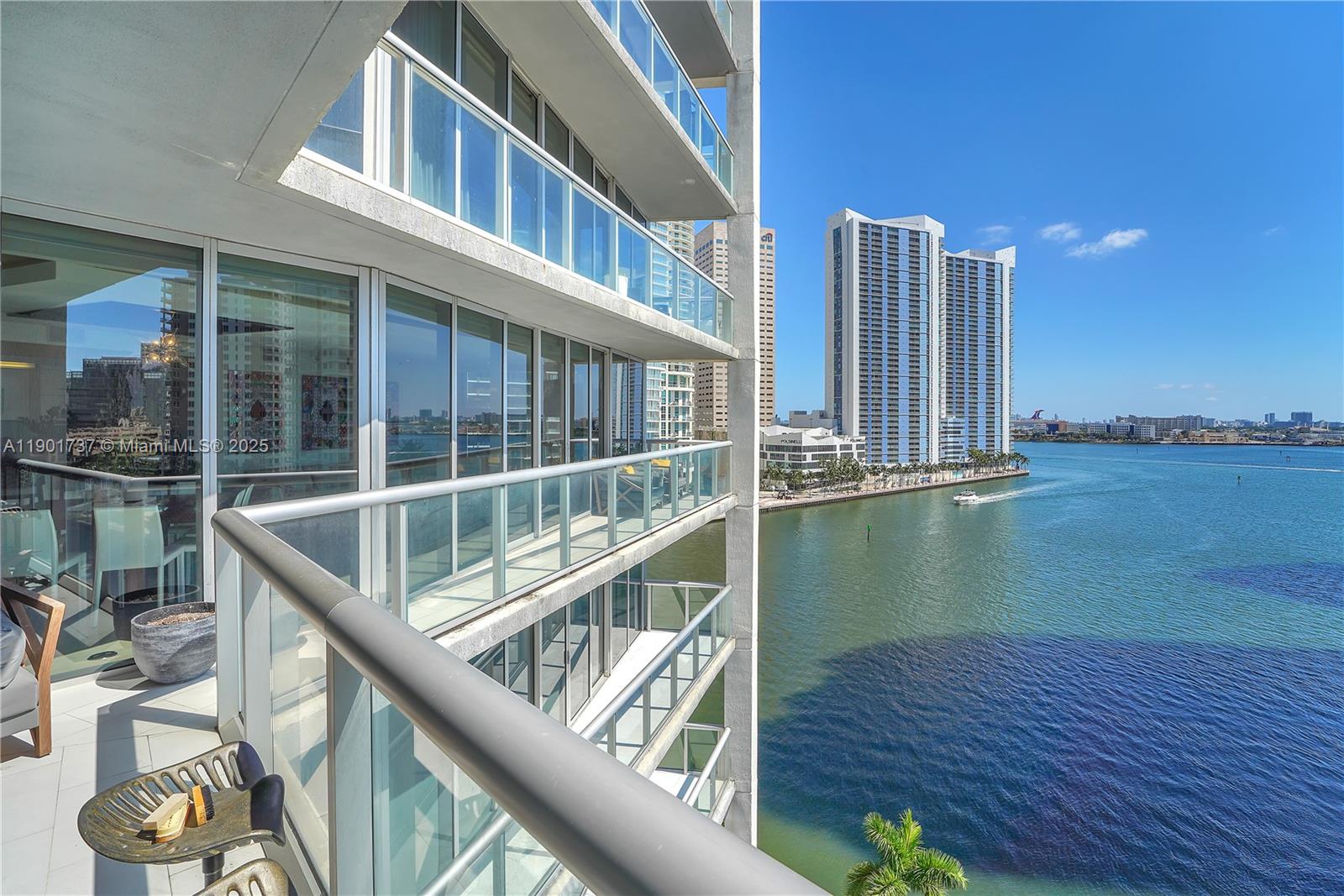 465 Brickell Avenue, Unit 1001 Miami, FL 33131 - Photo 41 of 42 a balcony with hardwood