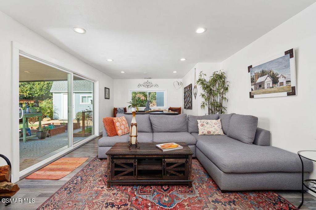 1135 Donner Avenue Simi Valley, CA 93065 - Photo 16 of 48 a living room with furniture and a rug