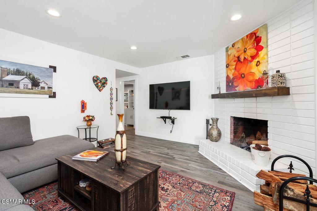1135 Donner Avenue Simi Valley, CA 93065 - Photo 17 of 48 a living room with furniture and a flat screen tv