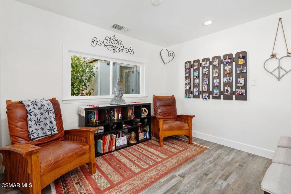 1135 Donner Avenue Simi Valley, CA 93065 - Photo 19 of 48 a living room with furniture and a large window