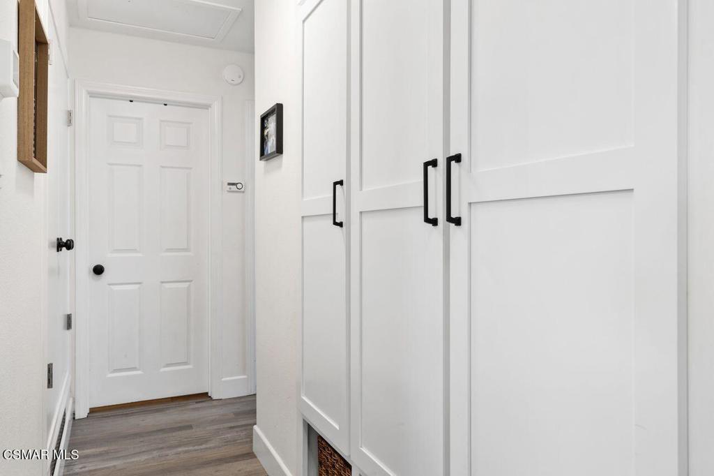 1135 Donner Avenue Simi Valley, CA 93065 - Photo 23 of 48 a view of a hallway with wooden floor