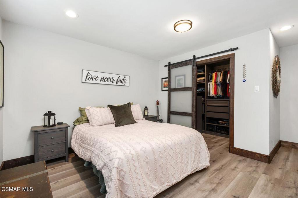 1135 Donner Avenue Simi Valley, CA 93065 - Photo 28 of 48 a bedroom with a bed and a closet