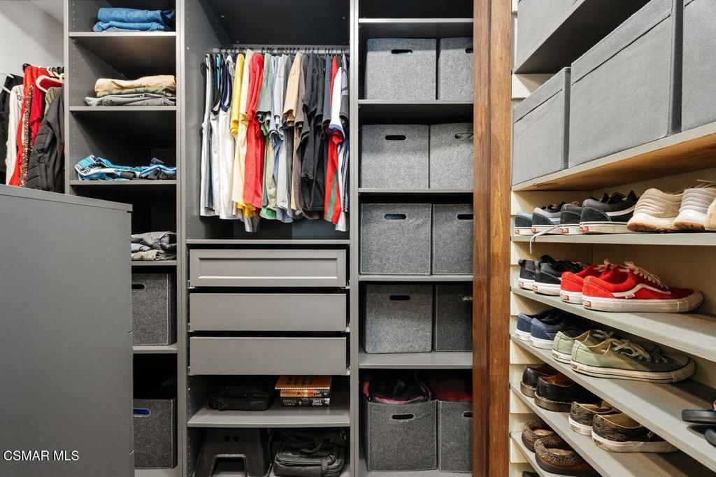 1135 Donner Avenue Simi Valley, CA 93065 - Photo 29 of 48 a view of walk in closet with clothes and shoes