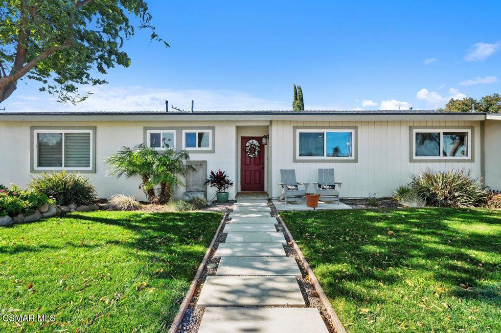 1135 Donner Avenue Simi Valley, CA 93065 - Photo 4 of 48 a front view of a house with a yard