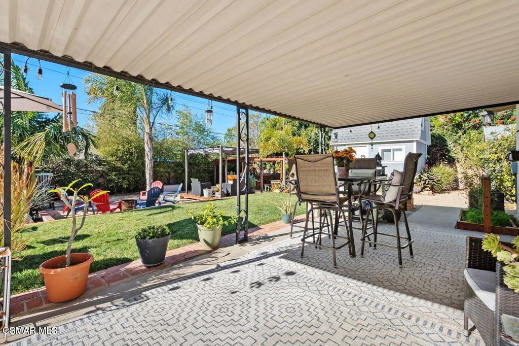 1135 Donner Avenue Simi Valley, CA 93065 - Photo 44 of 48 a view of a patio with chairs and plants