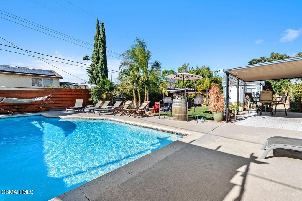 1135 Donner Avenue Simi Valley, CA 93065 - Photo 47 of 48 a view of a swimming pool with a patio