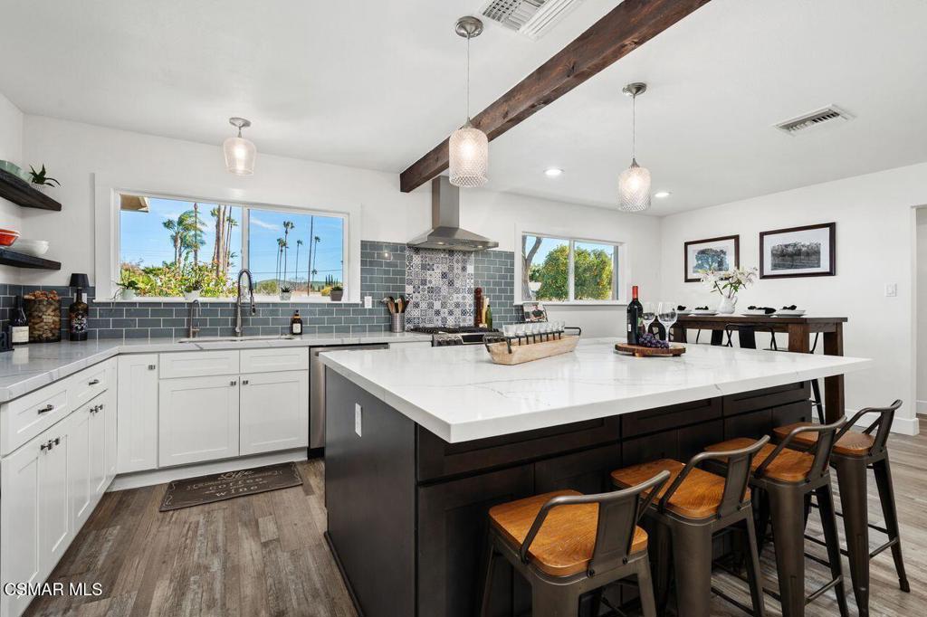 1135 Donner Avenue Simi Valley, CA 93065 - Photo 10 of 48 a kitchen with a sink cabinets and window