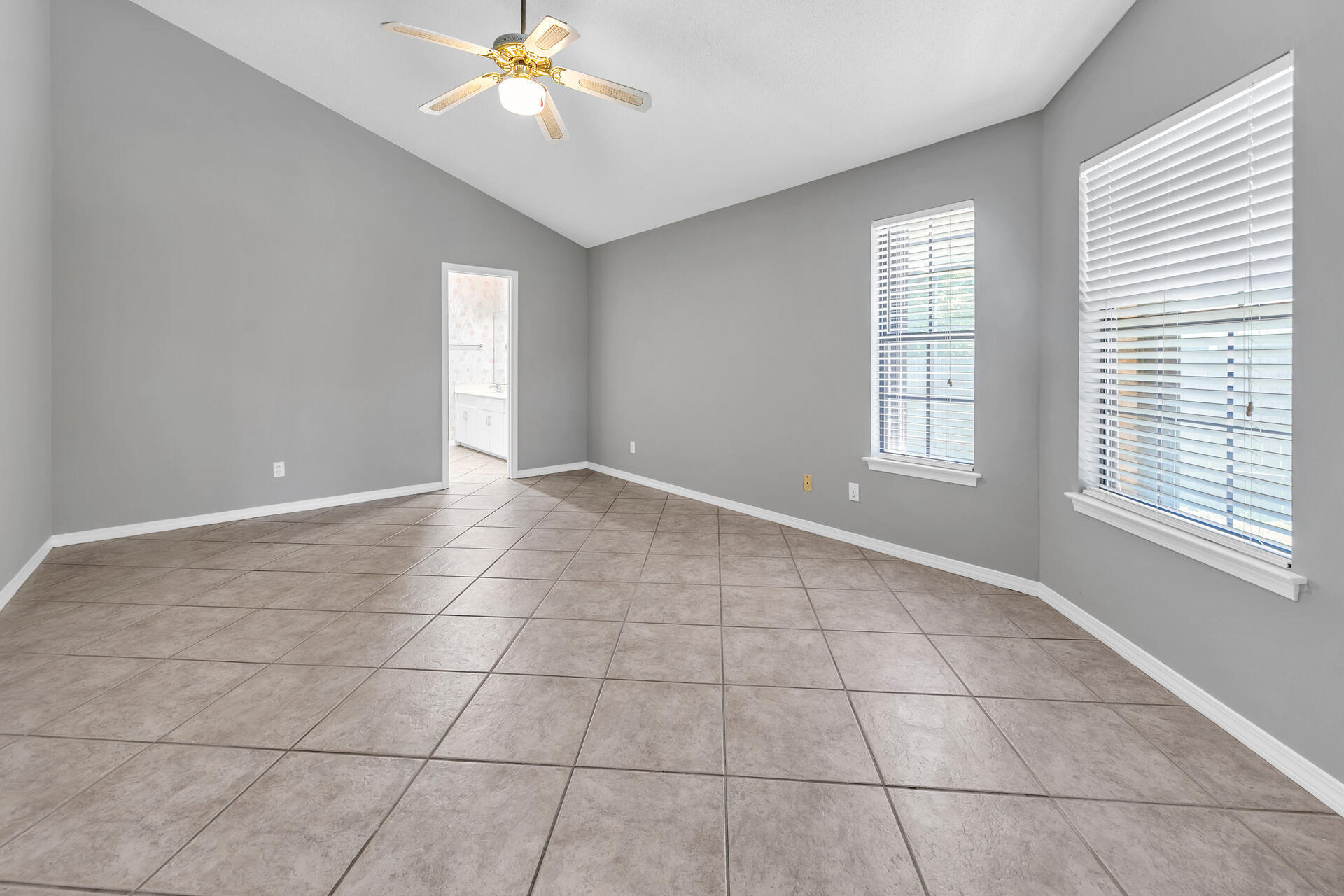 326 Sailfish Circle Destin, FL 32541 - Photo 15 of 28 a view of an empty room with a window