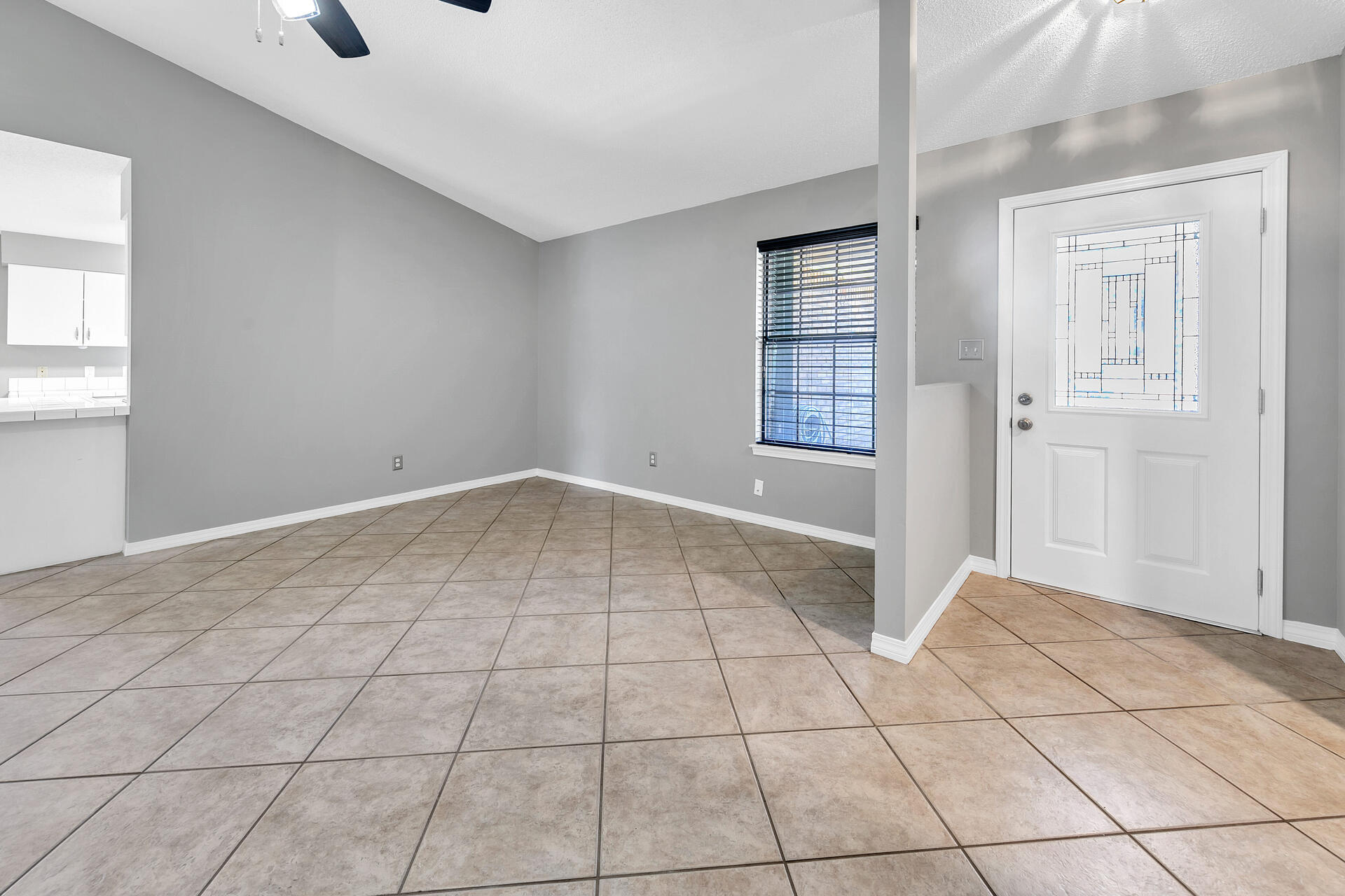 326 Sailfish Circle Destin, FL 32541 - Photo 7 of 28 a view of an empty room with window and wooden floor