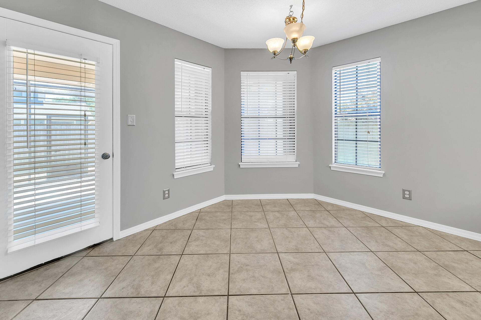326 Sailfish Circle Destin, FL 32541 - Photo 10 of 28 a view of an empty room with a window