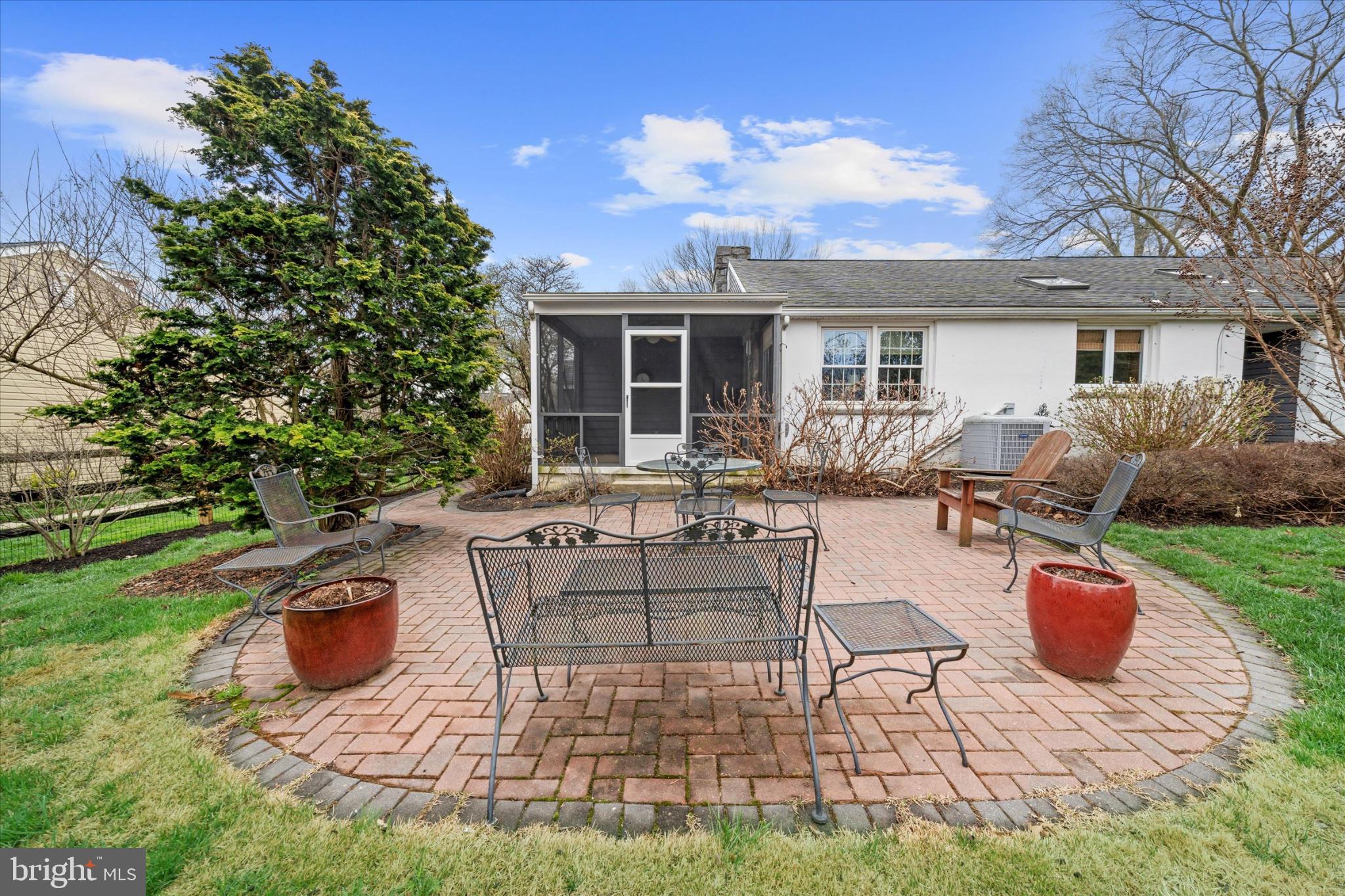 47 Paschall Road Wilmington, DE 19803 - Photo 23 of 26 Charming patio retreat in lush greenery.