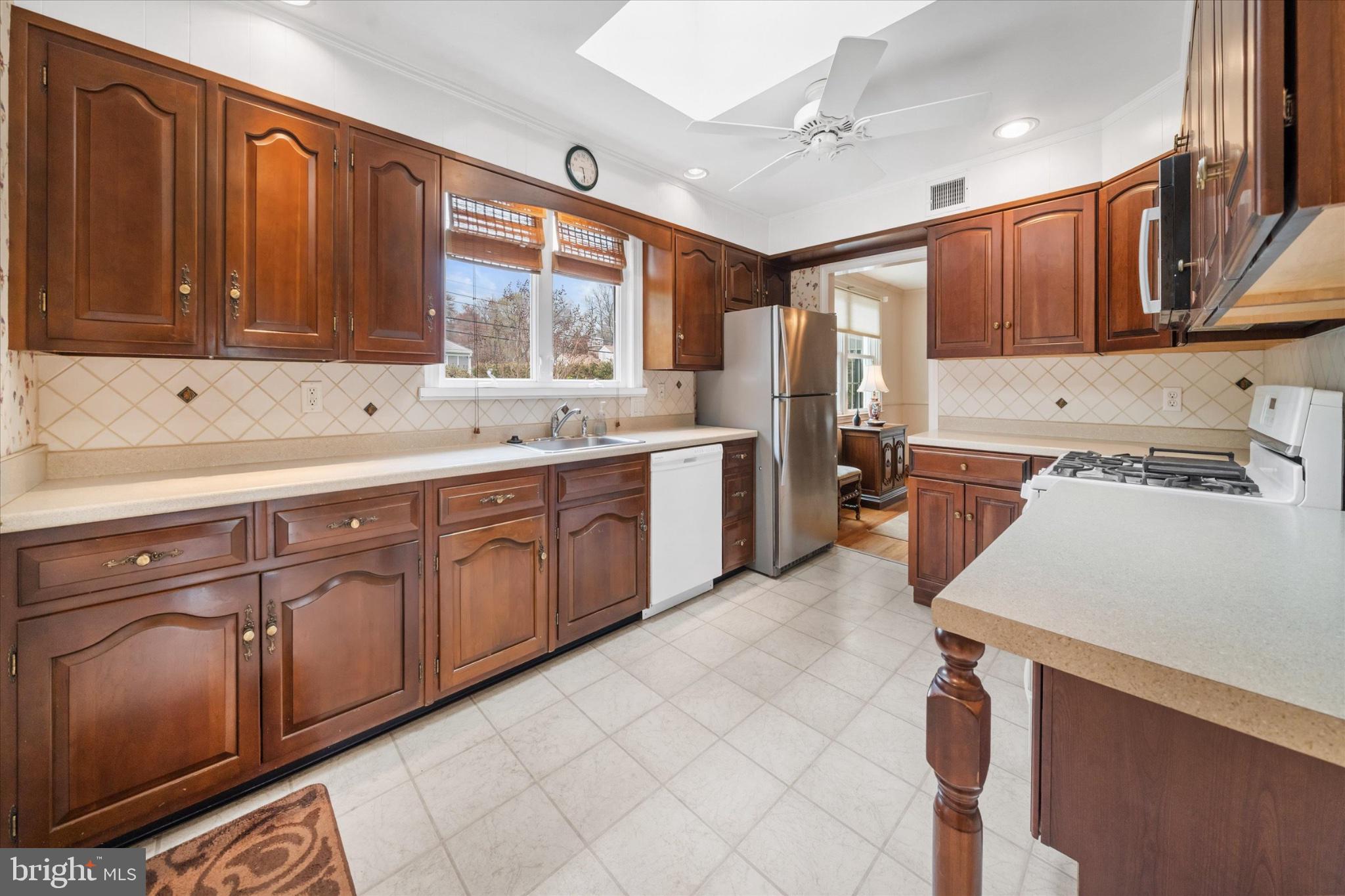 47 Paschall Road Wilmington, DE 19803 - Photo 8 of 26 Warm wooden kitchen with natural light.