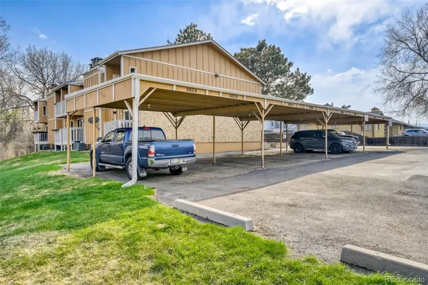 a view of a house with a sink and a yard