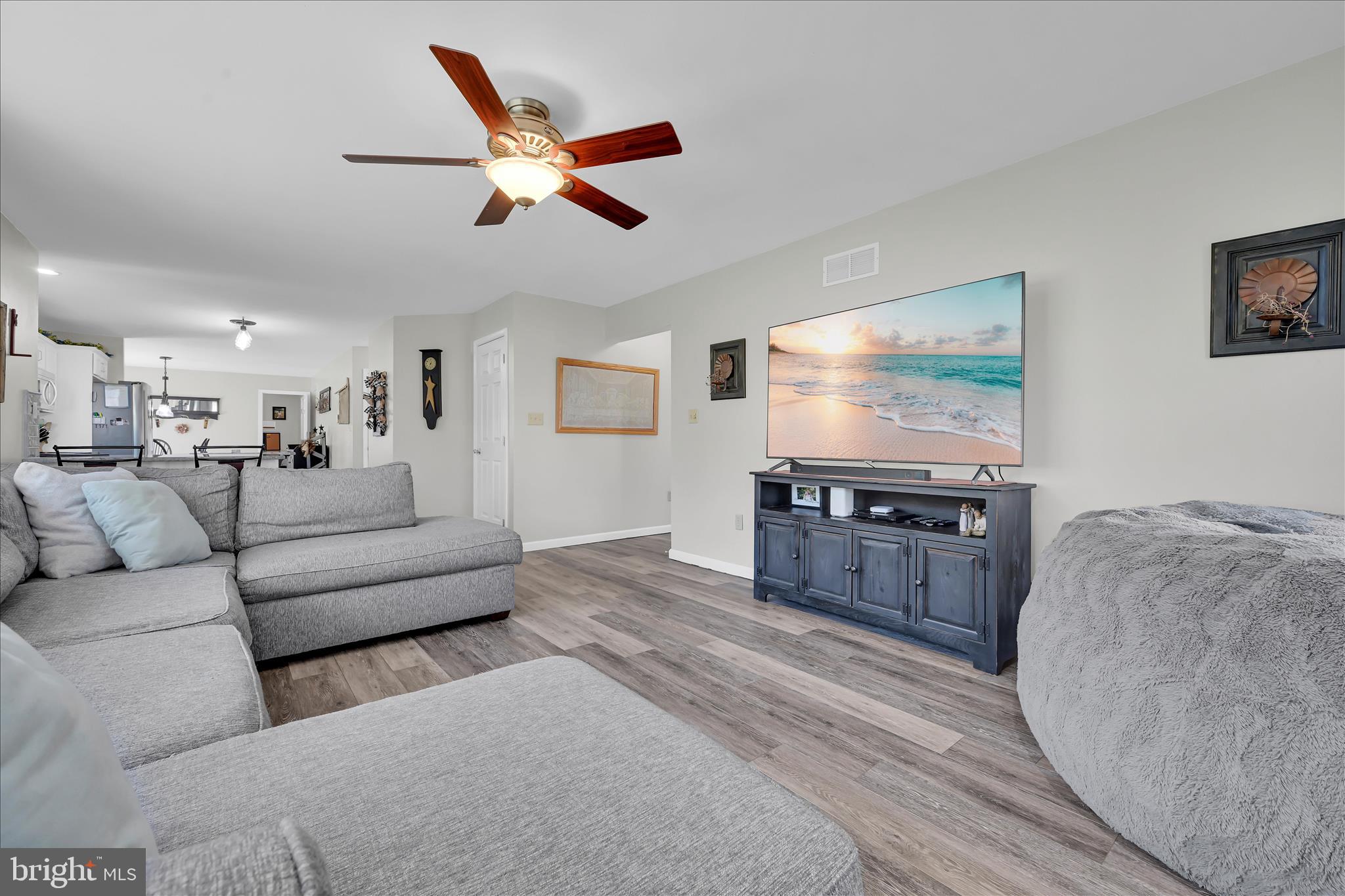111 Holly Road Orwigsburg, PA 17961 - Photo 12 of 46 a living room with furniture and a flat screen tv