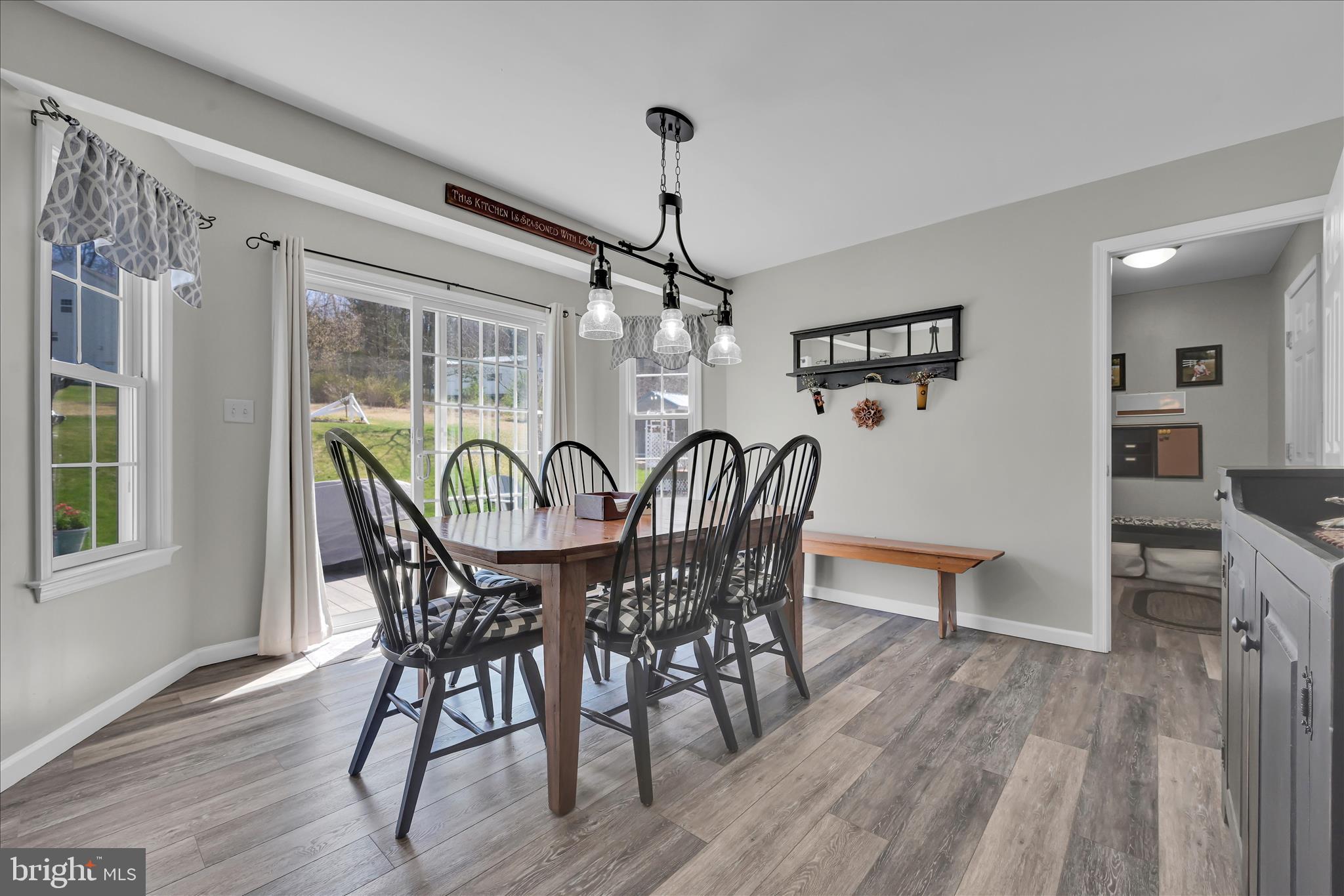 111 Holly Road Orwigsburg, PA 17961 - Photo 13 of 46 a view of a dining room with furniture window and wooden floor