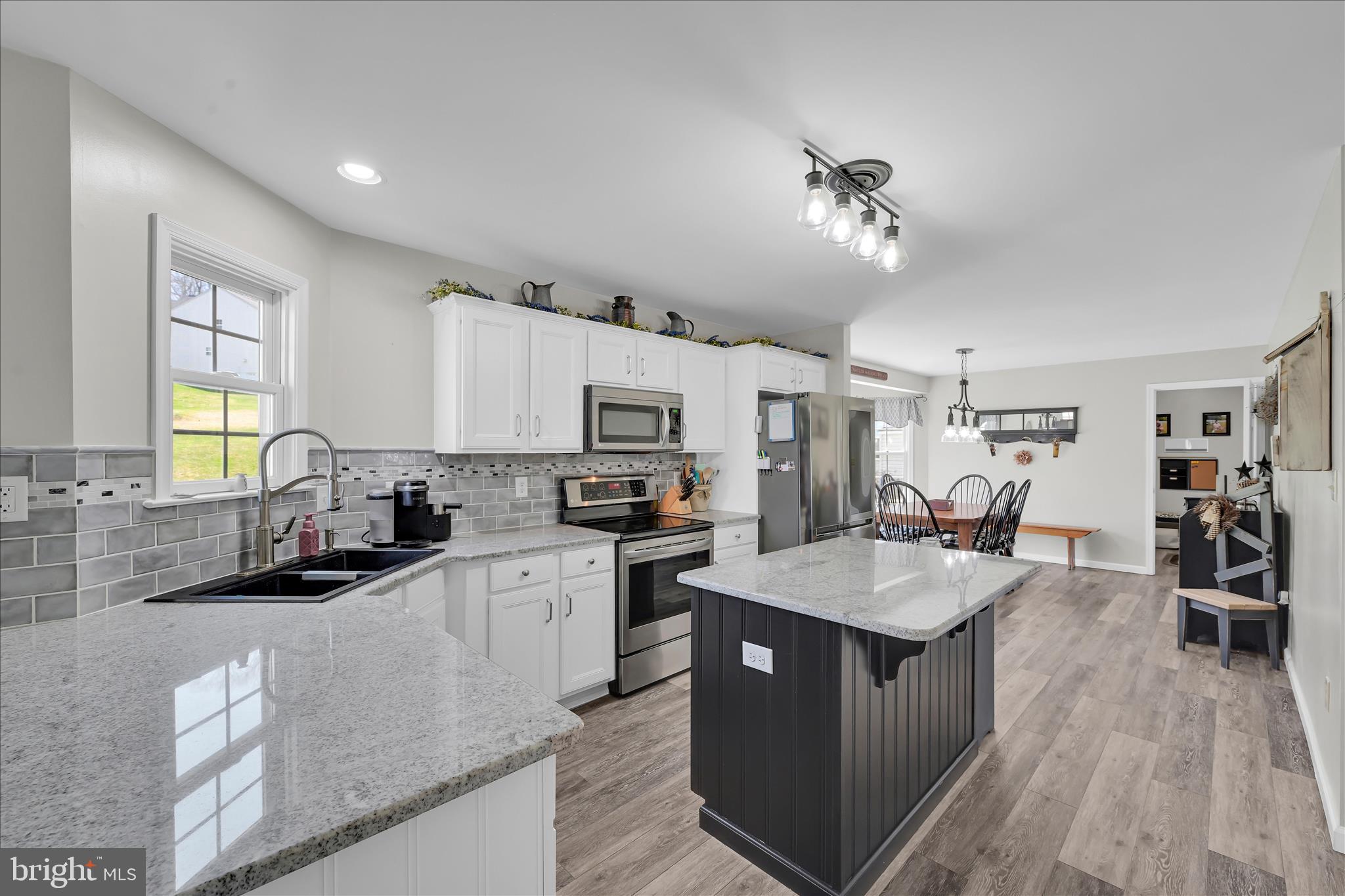 111 Holly Road Orwigsburg, PA 17961 - Photo 17 of 46 a large kitchen with stainless steel appliances granite countertop lots of counter top space