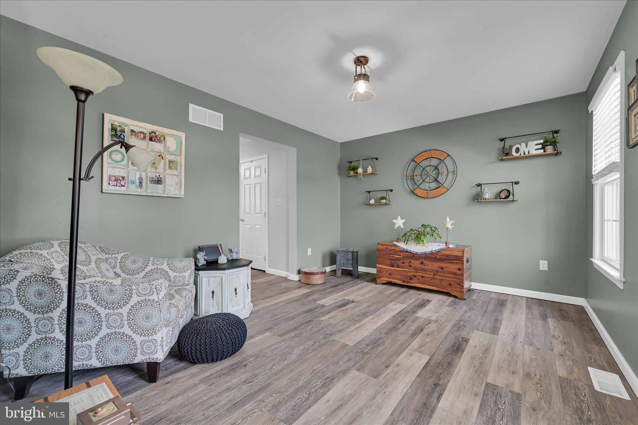 111 Holly Road Orwigsburg, PA 17961 - Photo 21 of 46 a bedroom with a bed and a window
