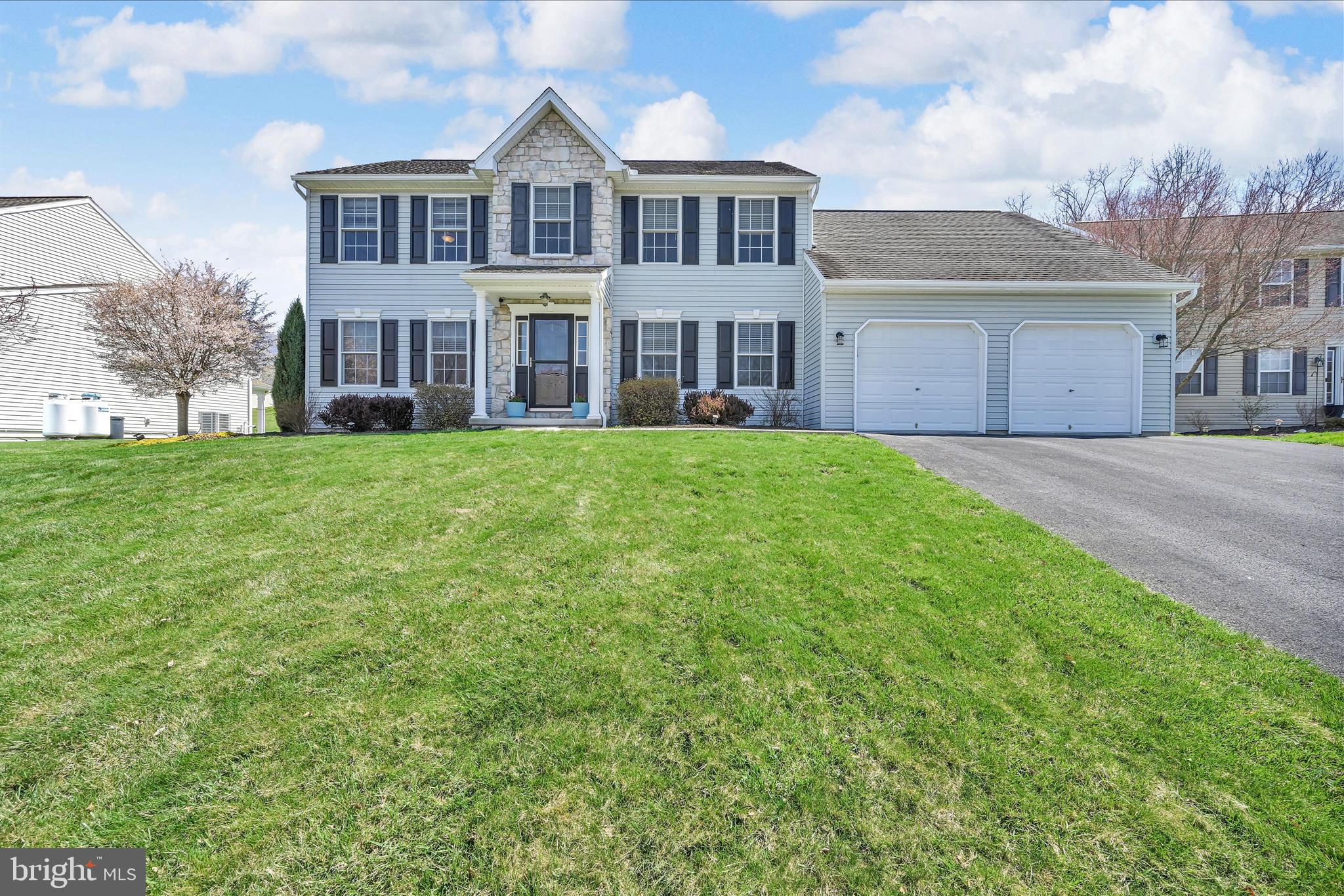 111 Holly Road Orwigsburg, PA 17961 - Photo 3 of 46 a view of a yard in front of a house with large tree