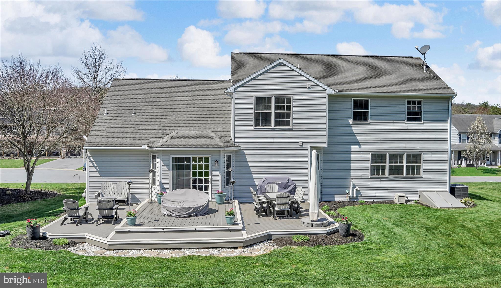 111 Holly Road Orwigsburg, PA 17961 - Photo 44 of 46 a front view of a house with a yard porch and outdoor seating